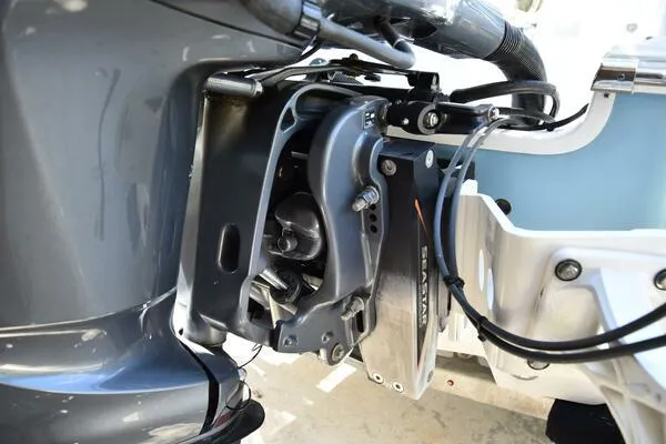 Slide: The Image of 2018 Sportsman Tournament 214 Bay Boat engine close-up, showcasing motor and mounting details. - 10