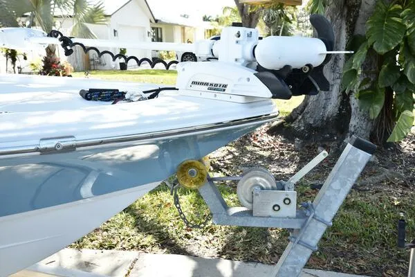 Slide: The Image of 2018 Sportsman Tournament 214 Bay Boat with Minn Kota trolling motor on trailer. - 11