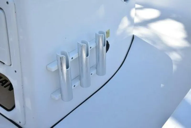 Slide: The Image of 2018 Sportsman Tournament 214 Bay Boat rod holders on white surface. - 13