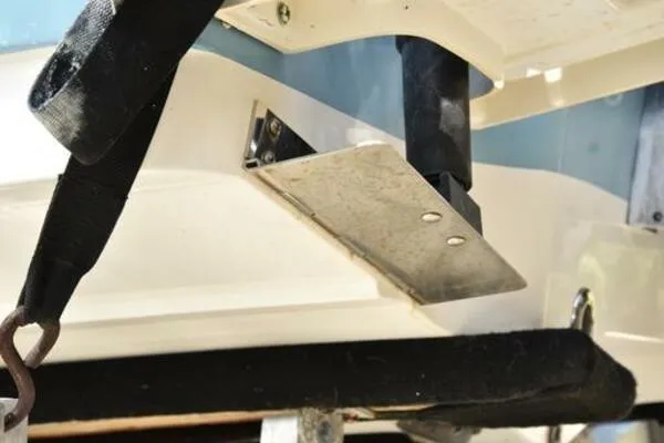 Slide: The Image of 2018 Sportsman Tournament 214 Bay Boat transom detail with metal bracket and strap. - 17