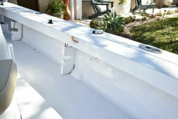 Slide: The Image of 2018 Sportsman Tournament 214 Bay Boat interior with clean white deck and seating. - 28