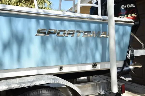 Slide: The Image of 2018 Sportsman Tournament 214 Bay Boat on trailer, featuring Yamaha engine. - 33