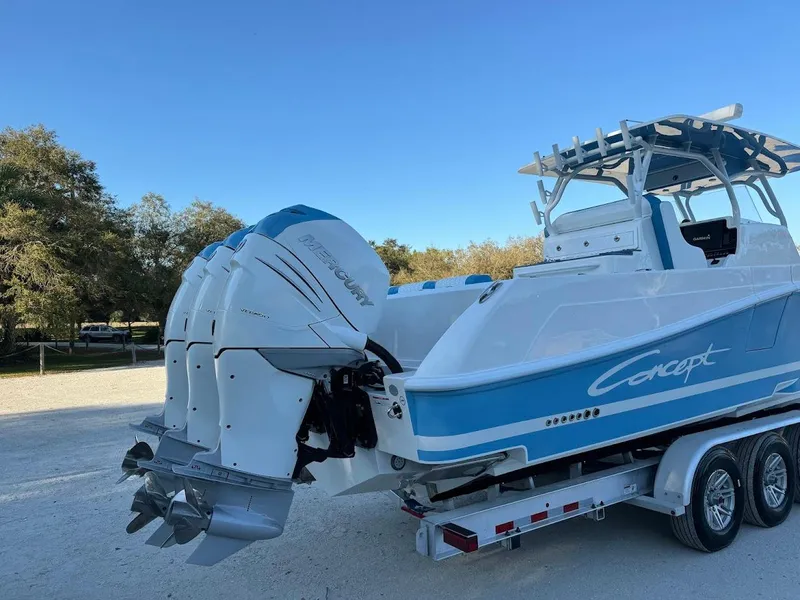 Slide: The Image of 2018 Concept 392 Family Edition boat on trailer with powerful outboard engines. - 15