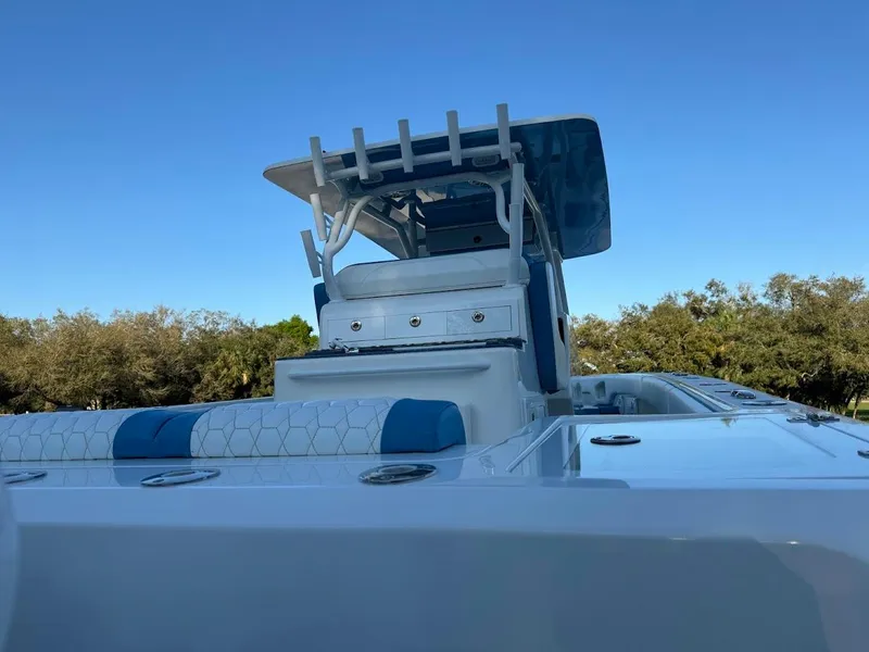Slide: The Image of 2018 Concept 392 Family Edition boat with sleek design and blue accents. - 25