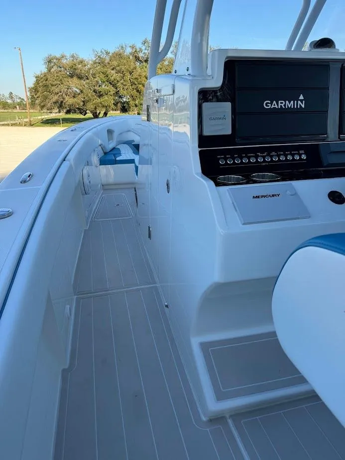 Slide: The Image of 2018 Concept 392 Family Edition boat with Garmin navigation system, side view. - 30