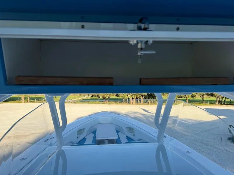Slide: The Image of 2018 Concept 392 Family Edition boat interior with open storage compartment. - 40