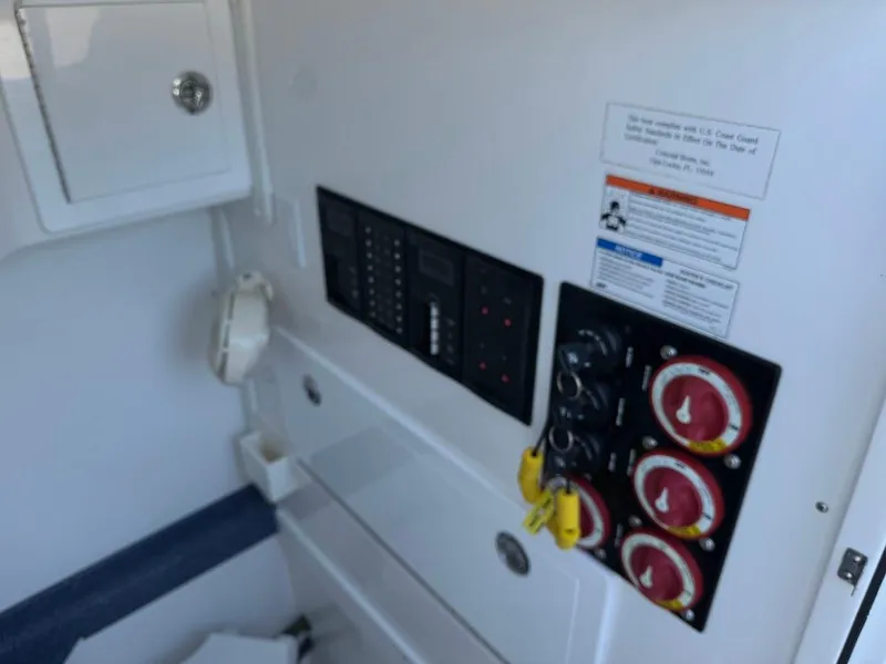 Slide: The Image of Control panel of 2018 Concept 392 Family Edition boat with switches and dials. - 42