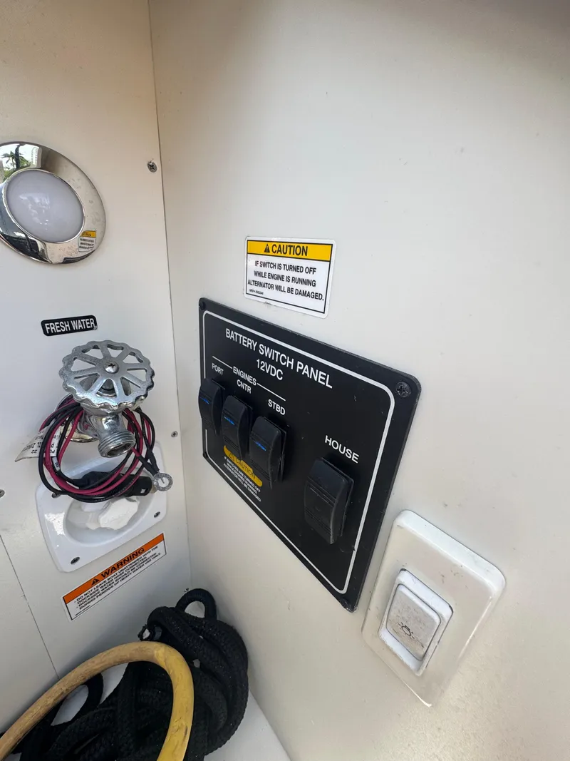 Slide: The Image of Battery switch panel on 2021 Sea Ray Sundancer 320 Coupe Outboard boat. - 44