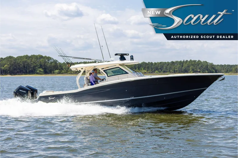 The Image of 2025 Scout 400 LXF Li-Ion boat cruising on a lake, authorized dealer logo visible. - 0