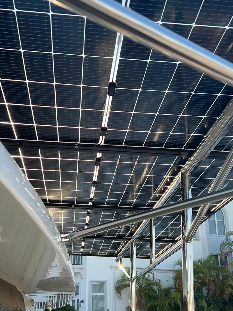 Slide: The Image of Solar panels on a 2017 Lagoon 620 yacht, showcasing sustainable energy integration. - 25