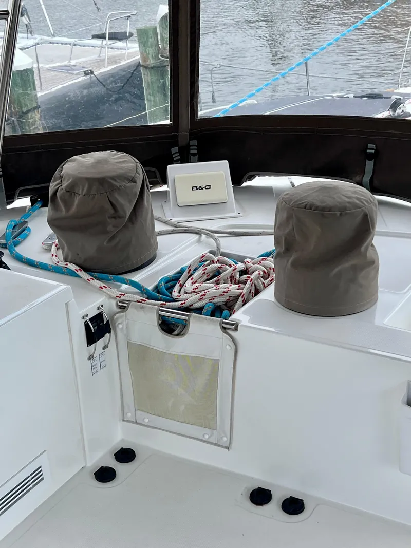 Slide: The Image of 2017 Lagoon 620 yacht deck with ropes and navigation equipment. - 42