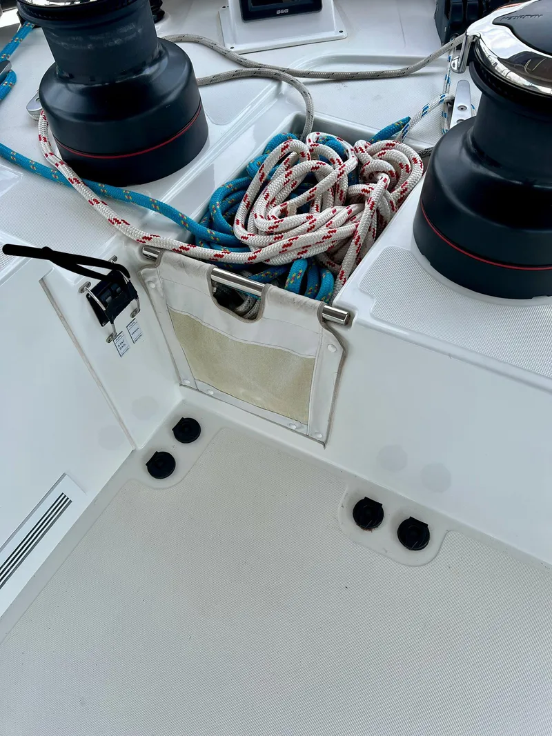 Slide: The Image of Lagoon 620 yacht deck with winches and coiled ropes, 2017 model. - 44