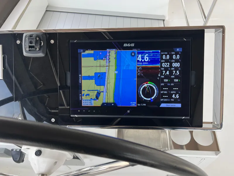 Slide: The Image of Navigation display on 2017 Lagoon 620 yacht, showing maps and sailing data. - 49