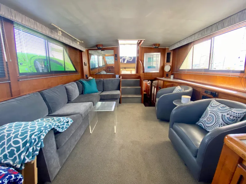 Slide: The Image of Spacious interior of 1988 Californian Sundeck Motoryacht with comfortable seating and modern decor. - 19