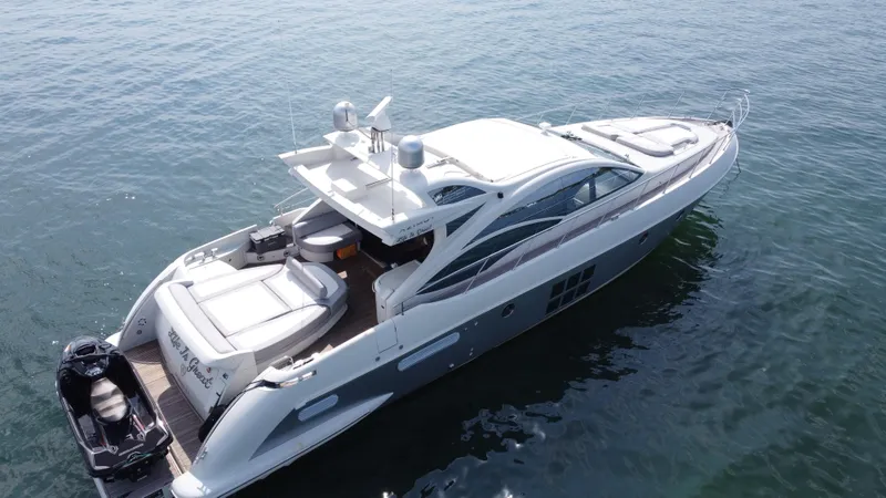 Slide: The Image of 2007 Azimut 62S yacht on calm water, aerial view. - 11