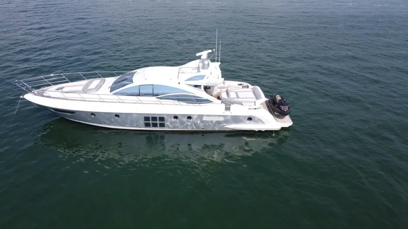Slide: The Image of 2007 Azimut 62S yacht on calm water, side view. - 3