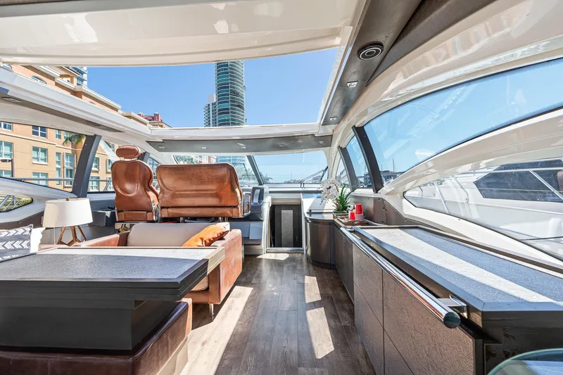 Slide: The Image of Luxurious interior of a 2007 Azimut 62S yacht with modern furnishings and panoramic windows. - 47