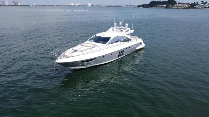 Slide: The Image of 2007 Azimut 62S yacht cruising on calm waters. - 8