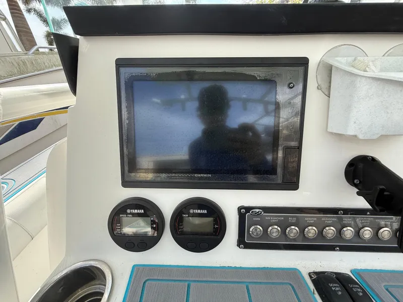Slide: The Image of Dashboard of a 2019 Sea Fox 228 Commander boat with navigation and control instruments. - 11