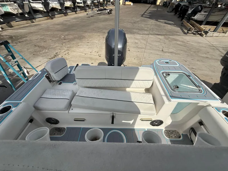Slide: The Image of 2019 Sea Fox 228 Commander boat interior with seating and storage compartments. - 27