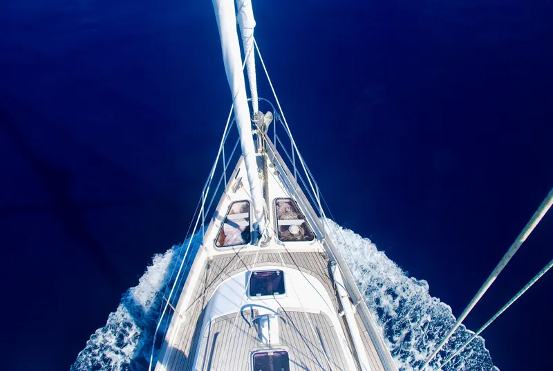 Slide: The Image of Aerial view of 2000 Roger Hill Cruising Cutter sailing on deep blue ocean. - 16