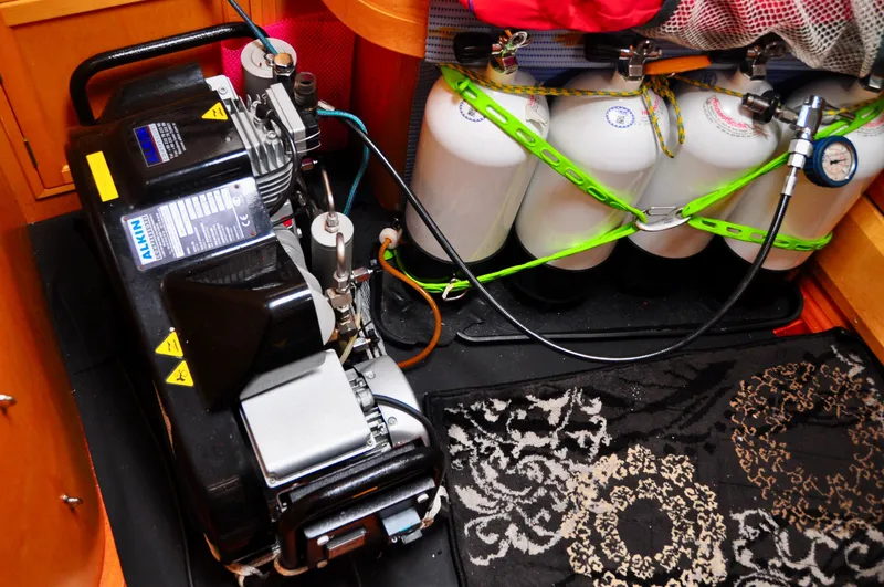 Slide: The Image of Engine room of 2000 Roger Hill Cruising Cutter with compressor and secured tanks. - 40