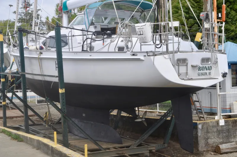 Slide: The Image of 2000 Roger Hill Cruising Cutter sailboat on dry dock, ready for maintenance. - 6