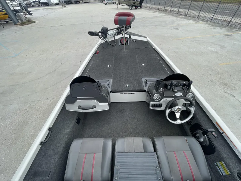 Slide: The Image of 2015 Ranger RT188 boat interior with dual consoles and seating. - 9