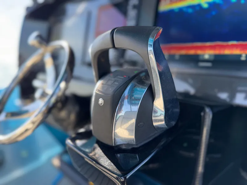 Slide: The Image of Throttle control on 2020 Nor-Tech 340 Sport Open Center Console boat dashboard. - 24