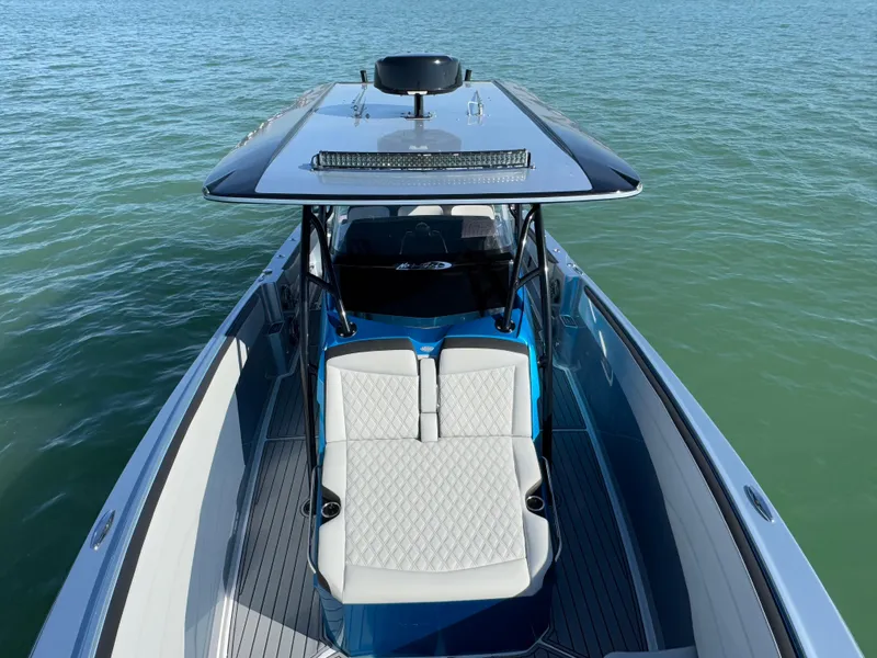 Slide: The Image of 2020 Nor-Tech 340 Sport Open Center Console boat on water, top view. - 29