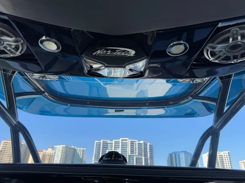 Slide: The Image of 2020 Nor-Tech 340 Sport Open Center Console boat with city skyline in background. - 31