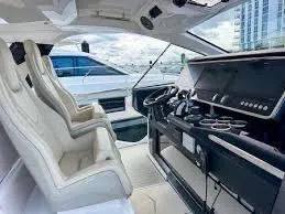 Slide: The Image of 2021 Azimut Verve 47 yacht cockpit with luxurious seating and modern controls. - 12