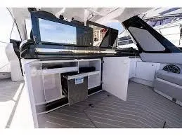 Slide: The Image of 2021 Azimut Verve 47 yacht interior with open storage compartments and sleek design. - 18