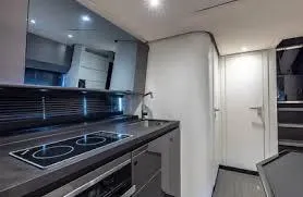 Slide: The Image of Modern kitchen interior of 2021 Azimut Verve 47 yacht with sleek design and appliances. - 27