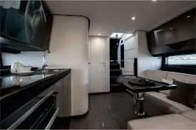 Slide: The Image of Interior of 2021 Azimut Verve 47 yacht, featuring modern kitchen and seating area. - 29