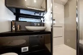 Slide: The Image of Luxurious bathroom interior of 2021 Azimut Verve 47 yacht, featuring modern fixtures and sleek design. - 30