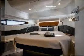 Slide: The Image of Luxurious cabin interior of 2021 Azimut Verve 47 yacht, featuring elegant bedding and modern design. - 31