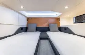 Slide: The Image of Interior cabin of 2021 Azimut Verve 47 yacht with twin beds and modern design. - 32