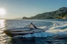 Slide: The Image of 2021 Azimut Verve 47 yacht cruising on scenic ocean with mountainous backdrop. - 38