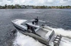 Slide: The Image of 2021 Azimut Verve 47 yacht cruising on open water, showcasing sleek design and powerful engines. - 6