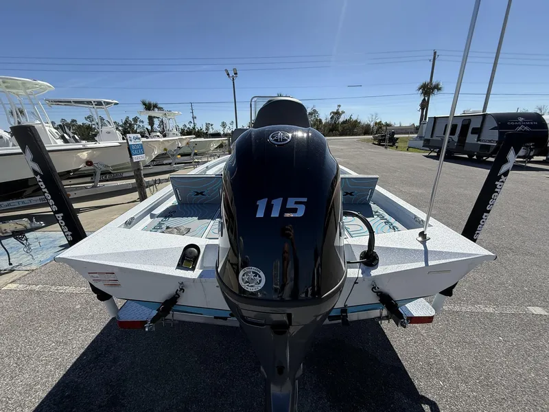 Slide: The Image of 2025 Xpress Hyper-Lift Series H20B boat with 115 horsepower engine, displayed outdoors. - 3