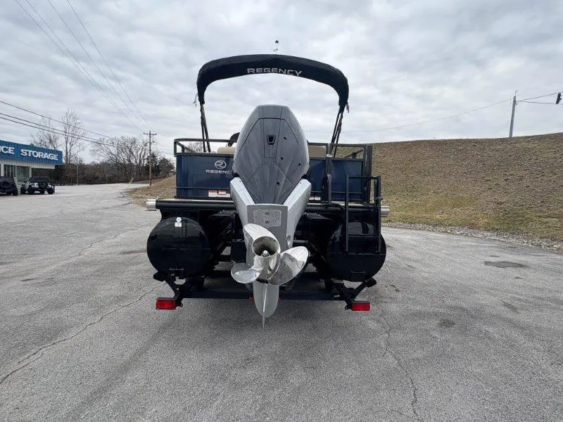 Slide: The Image of 2020 Regency 250 DL3 pontoon boat rear view with outboard motor. - 45