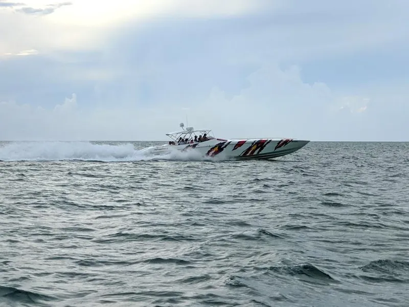 Slide: The Image of Nor-Tech 500 speedboat cruising on open water, 2001 model. - 3