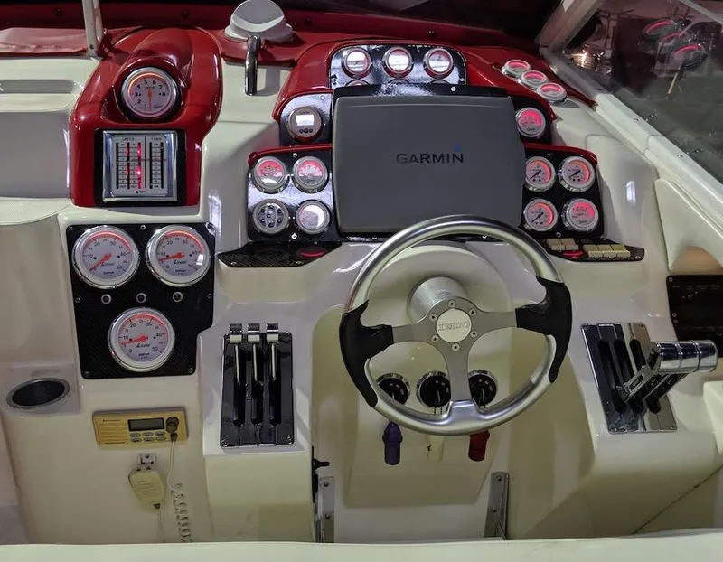 Slide: The Image of Control panel of a 2001 Nor-Tech 500 boat with Garmin navigation system. - 8