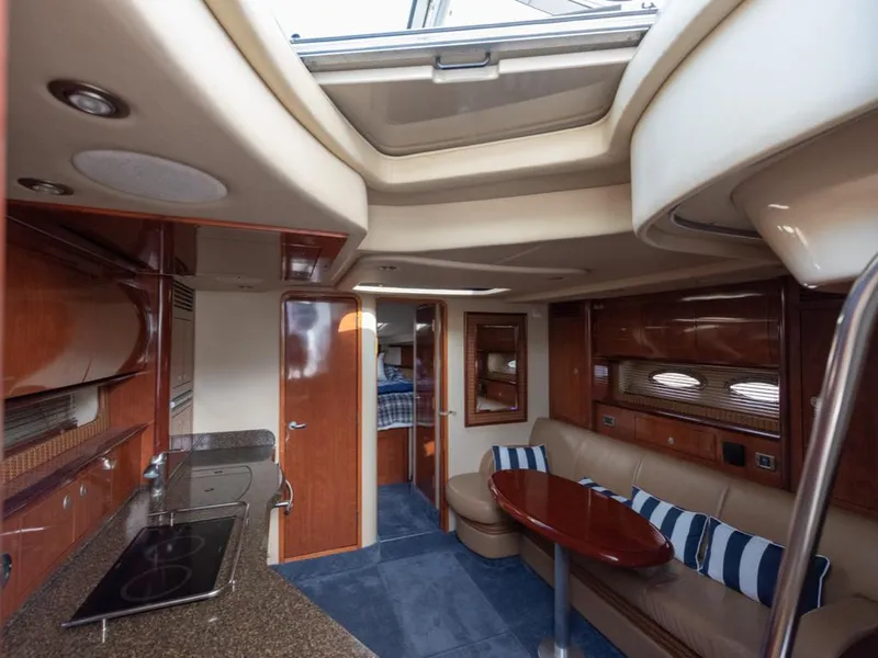 Slide: The Image of Luxurious interior of 2005 Sea Ray 390 Sundancer yacht with modern amenities. - 16