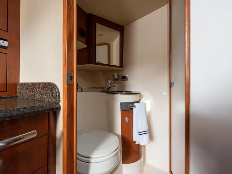 Slide: The Image of Luxurious bathroom in 2005 Sea Ray 390 Sundancer yacht with modern amenities. - 23