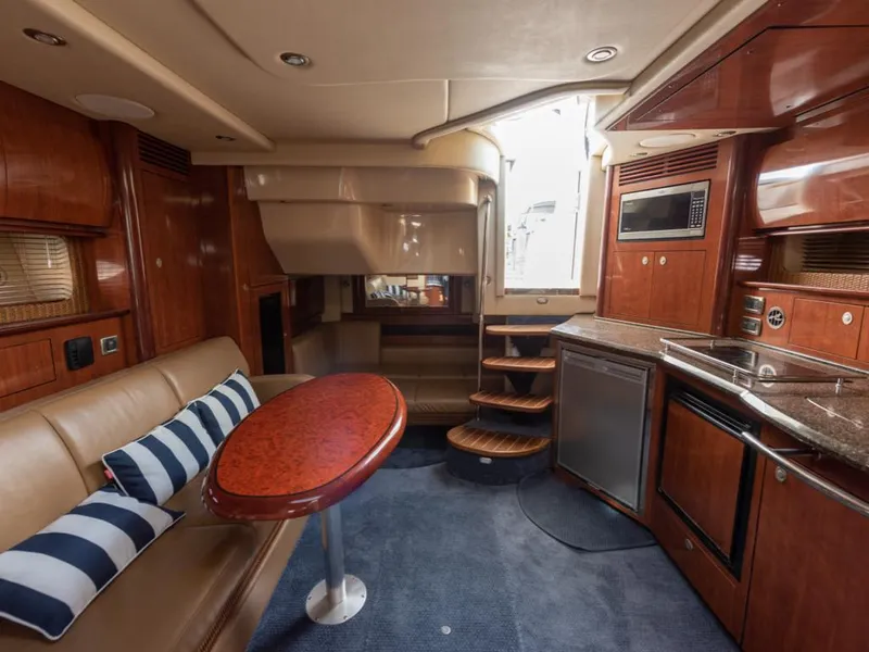 Slide: The Image of Luxurious interior of 2005 Sea Ray 390 Sundancer yacht with modern amenities. - 27