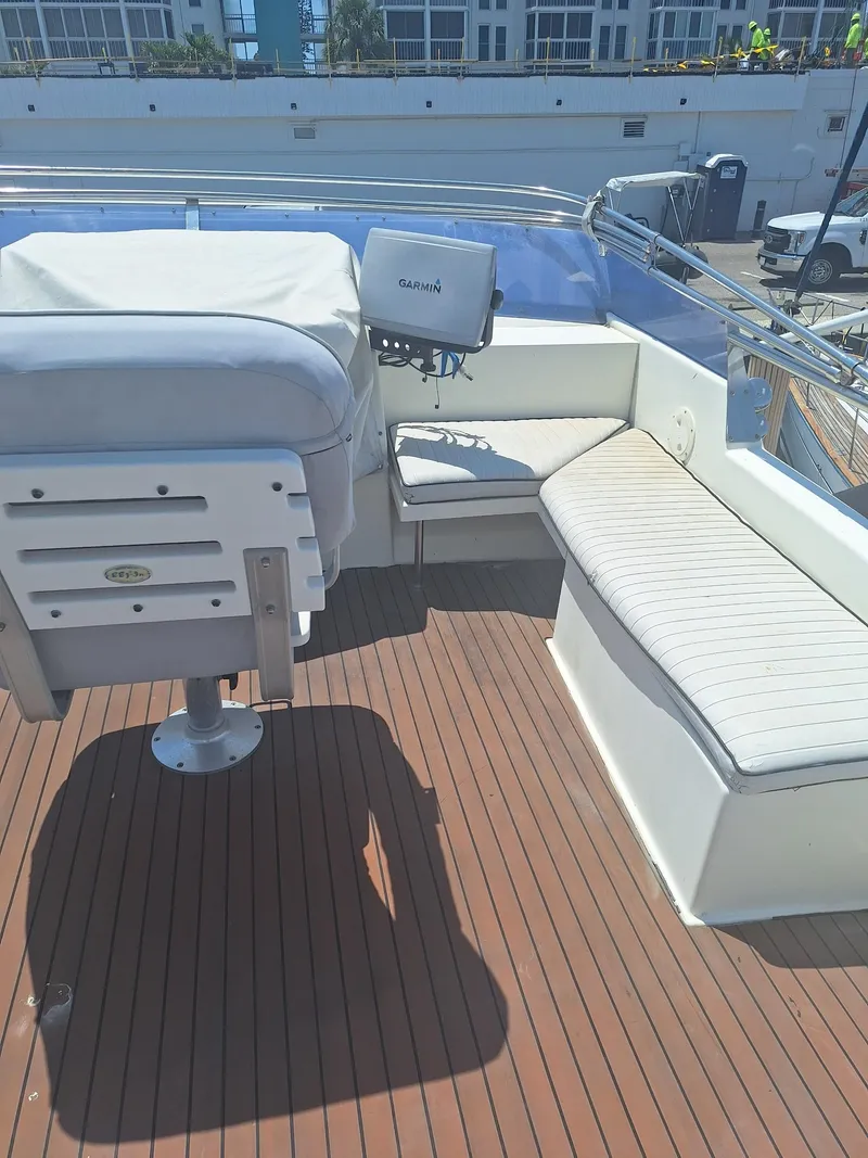 Slide: The Image of 1988 Birchwood 44TS yacht deck with seating and navigation equipment. - 43