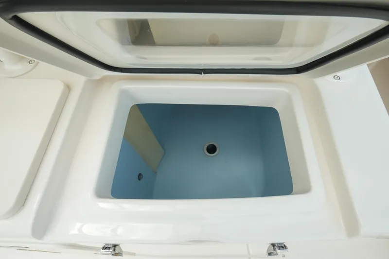 Slide: The Image of Livewell compartment on a 2019 Grady-White Canyon 336 boat. - 21
