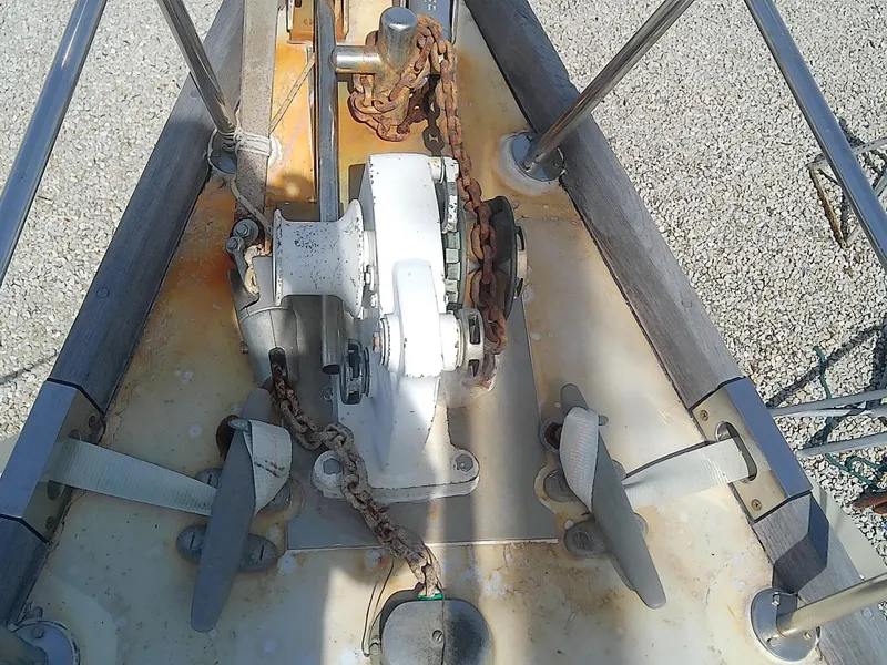 Slide: The Image of 1971 Morgan 40 Cruising Ketch anchor windlass and chain on deck. - 15